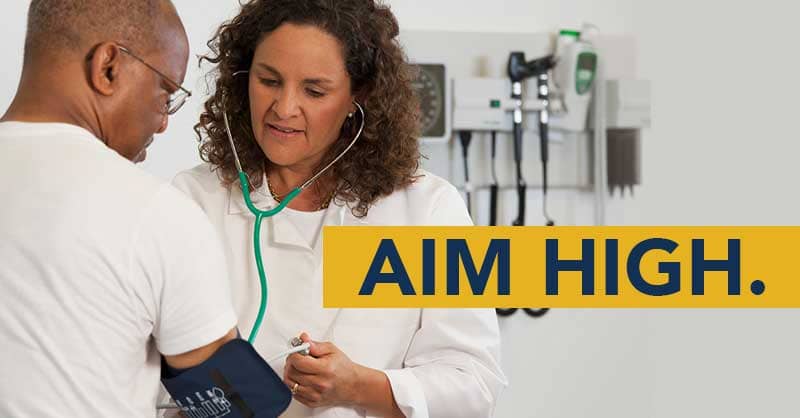 Aim High. - Nurse taking patient's blood pressure