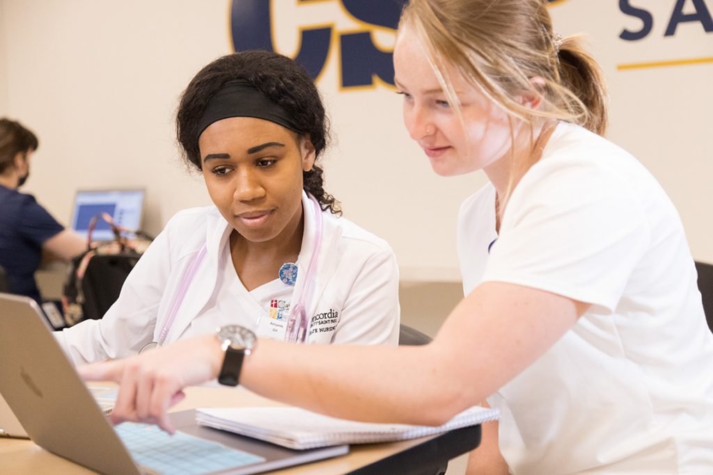 two Concordia St. Paul ABSN students studying together